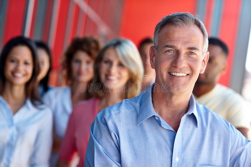 Portrait, business people and leader with teamwork, smile and confidence for creative agency. Face, group and employees royalty free stock photos