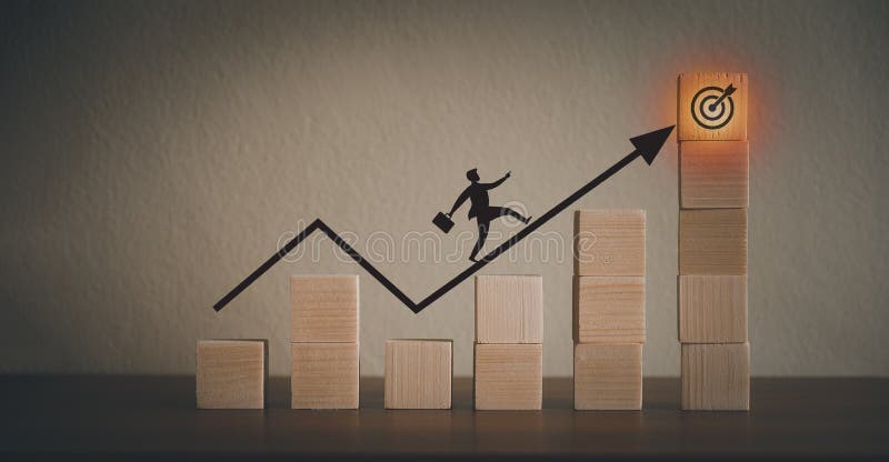 Portrait of a businessman walking on a graph Presentation to reach goals stock photos