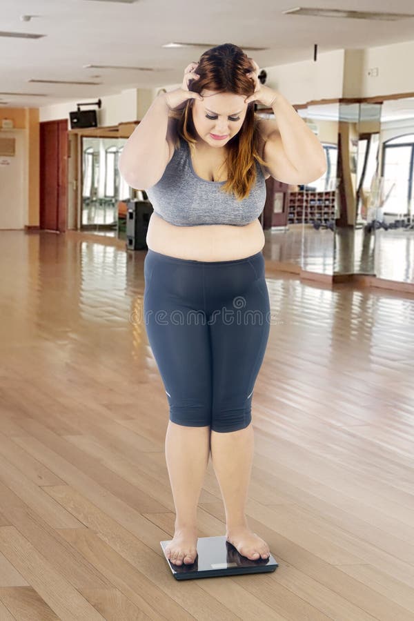 Download Fat Girl In A Gym Outfit Wallpaper