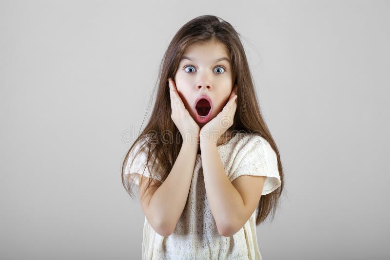 Portrait of a charming brunette little girl stock images Portrait of a charming brunette little girl stock images
