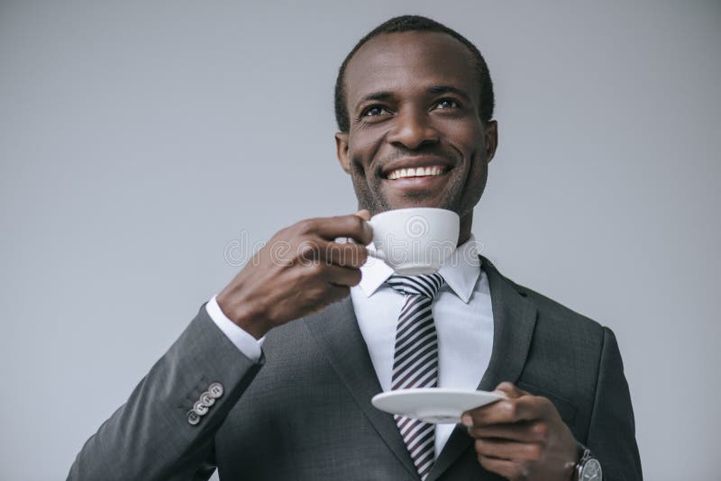 portrait of cheerful african american businessman drinking coffee stock photos portrait of cheerful african american businessman drinking coffee stock photos