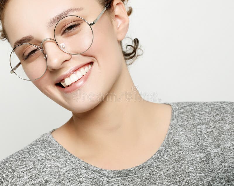 Portrait of cheerful beautiful woman eyewear with pleased look, stock photos Portrait of cheerful beautiful woman eyewear with pleased look, stock photos