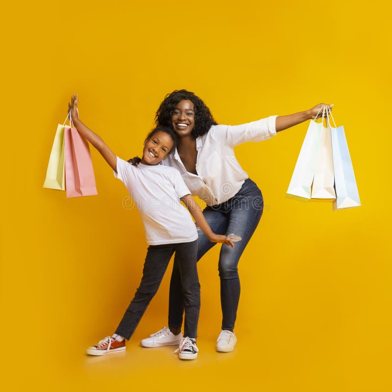 Afro Man and Woman Holding Lots of Shopping Bags, Closeup Stock Image ...