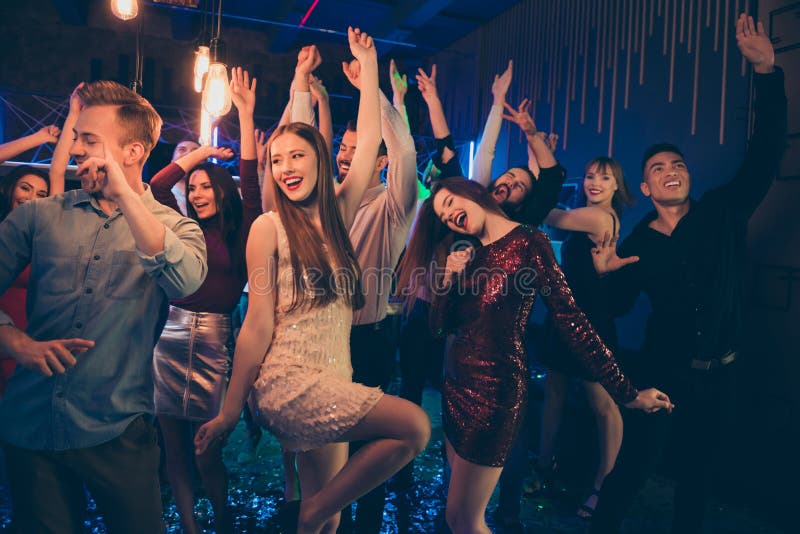 Portrait of Cheerful Group of People Mates Dancing in Nightclub Have ...