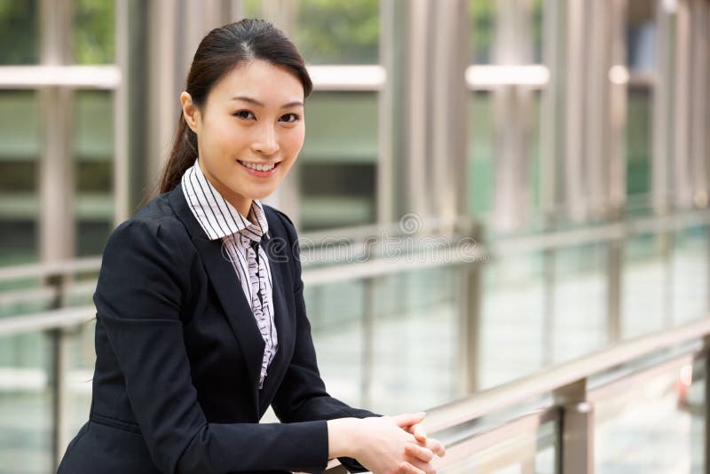Portrait Of Chinese Businesswoman Outside Office.