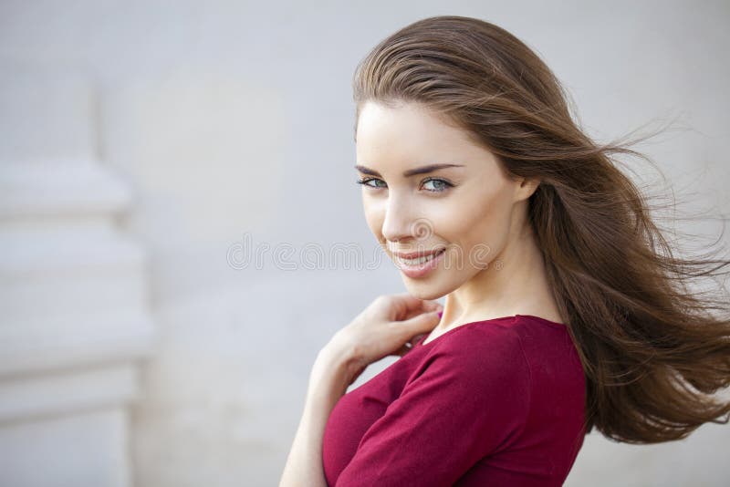 Portrait close up of young beautiful brunette woman