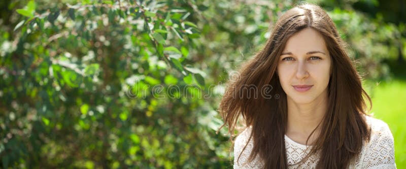 Portrait close up of young beautiful brunette woman