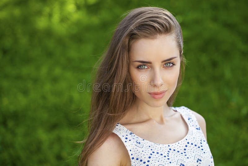 Portrait close up of young beautiful brunette woman