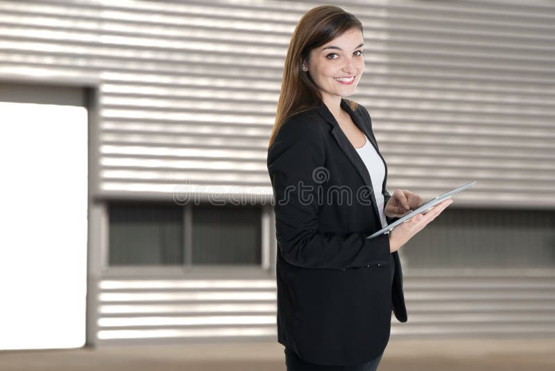 Portrait close up of young beautiful happy business woman in summer outdoors office headquarters stock image Portrait close up of young beautiful happy business woman in summer outdoors office headquarters stock image