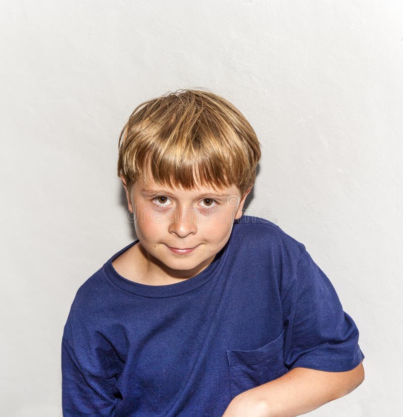 Portrait of Confident Looking Young Boy Stock Photo - Image of emotion ...