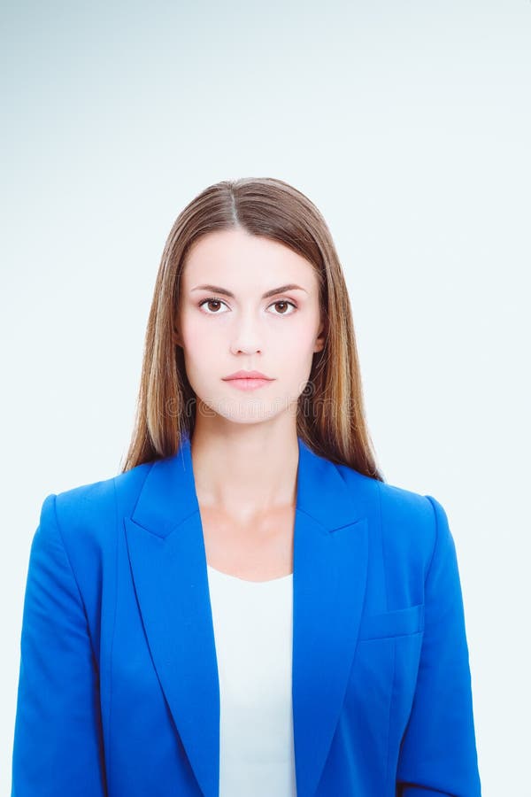 Portrait of a Confident Young Woman Standing Isolated on White ...