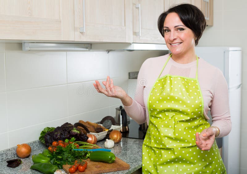 Portrait Of Cooking Brunette Housewife In Apron Stock Photo Image Of