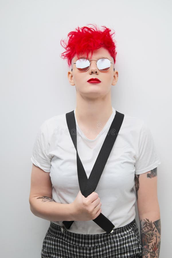 Portrait of a Cool Fashionable Modern Young Girl. a Short Haircut with  Shaved Temple. Dyed Bright Red Hair Stock Photo - Image of care, bright:  182863562