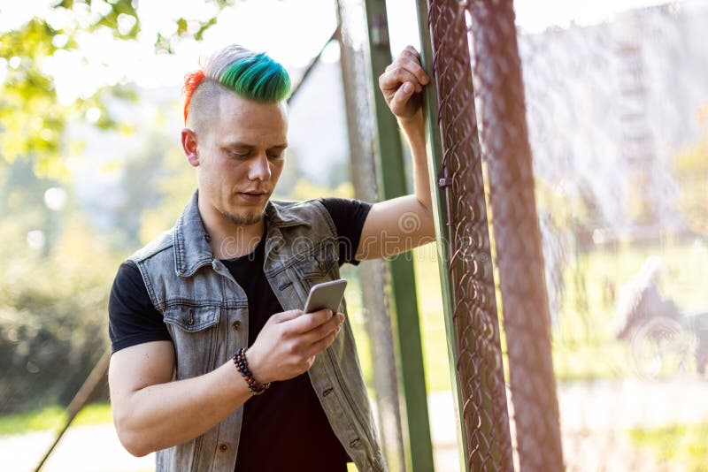Cool Punk Rocker Dyed Mohawk Hairstyle Stock Footage Video (100%  Royalty-free) 3439051679 | Shutterstock
