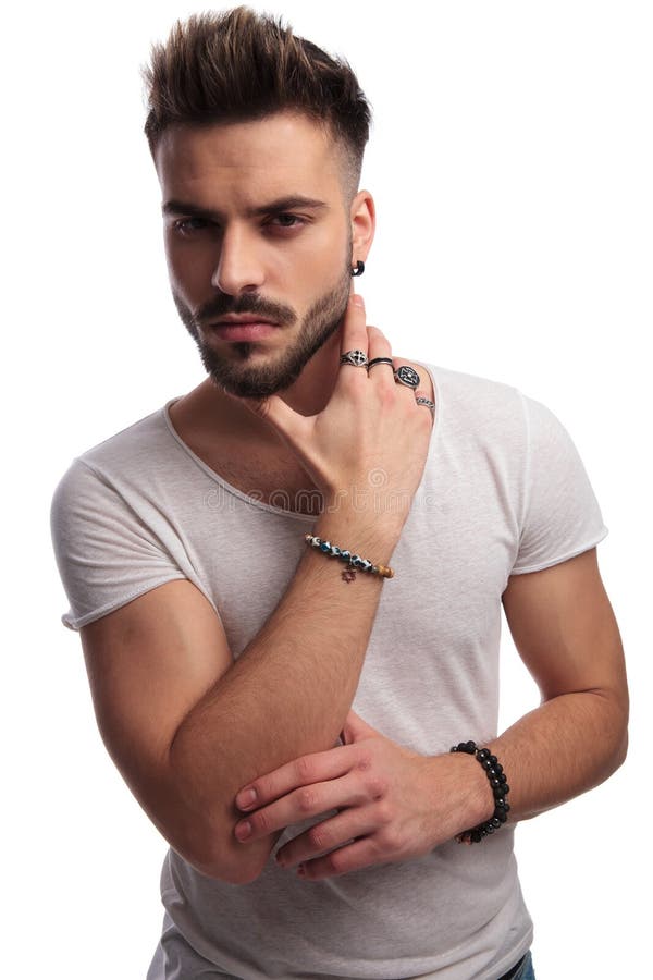 Portrait Of A Cools Guy Holding Hand On Neck Stock Photo Image of