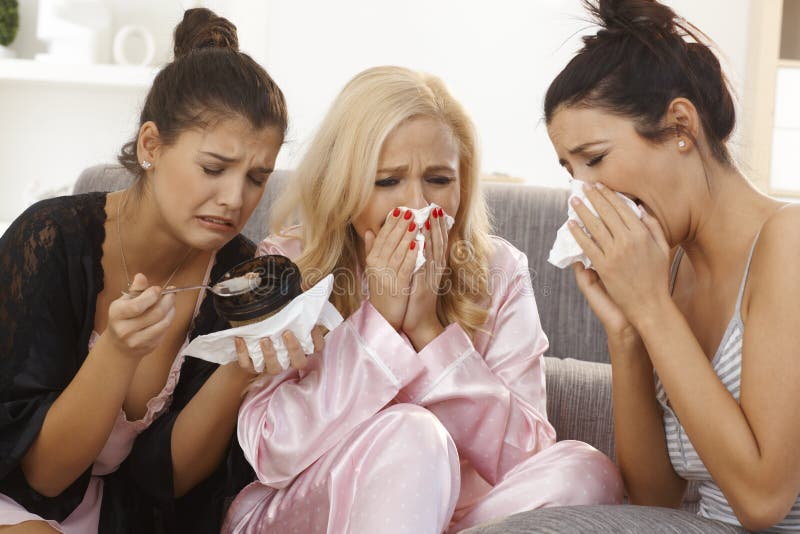 portrait-crying-women-home-three-sharing-sorrow-wearing-pyjamas-32813145.jpg