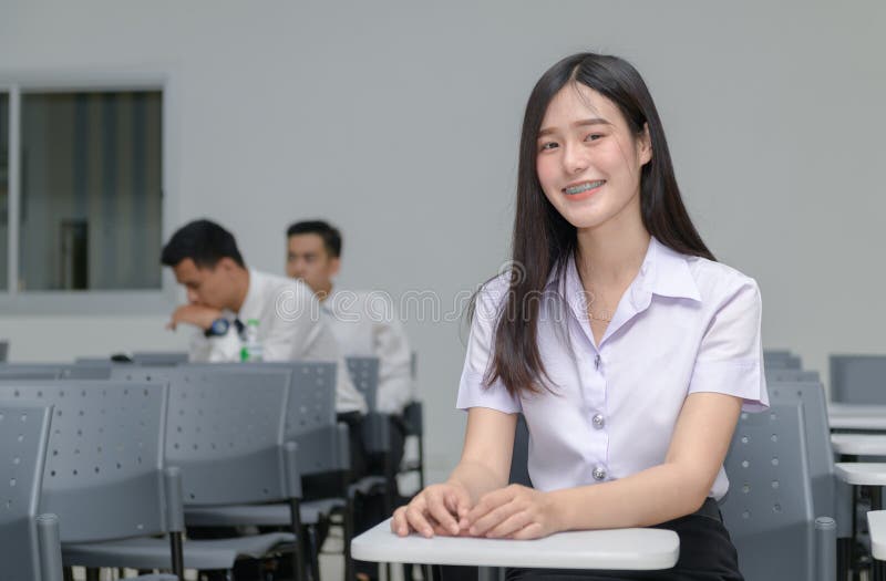 Portrait of cute asian girl student with braces on the teeth stock image Portrait of cute asian girl student with braces on the teeth stock image