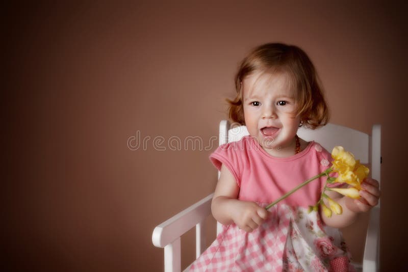 Portrait of a cute baby girl with flower royalty free stock images Portrait of a cute baby girl with flower royalty free stock images