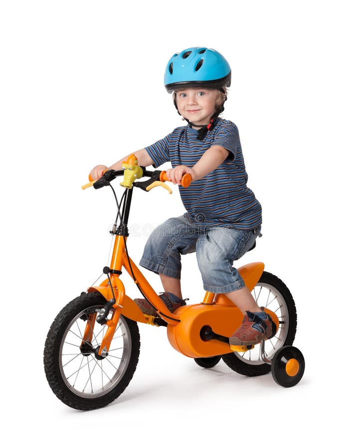 Portrait of a cute boy on bicycle stock images