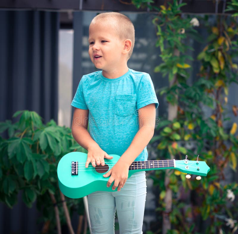Portrait of a Cute Boy with Ukulele Stock Image Image of artist