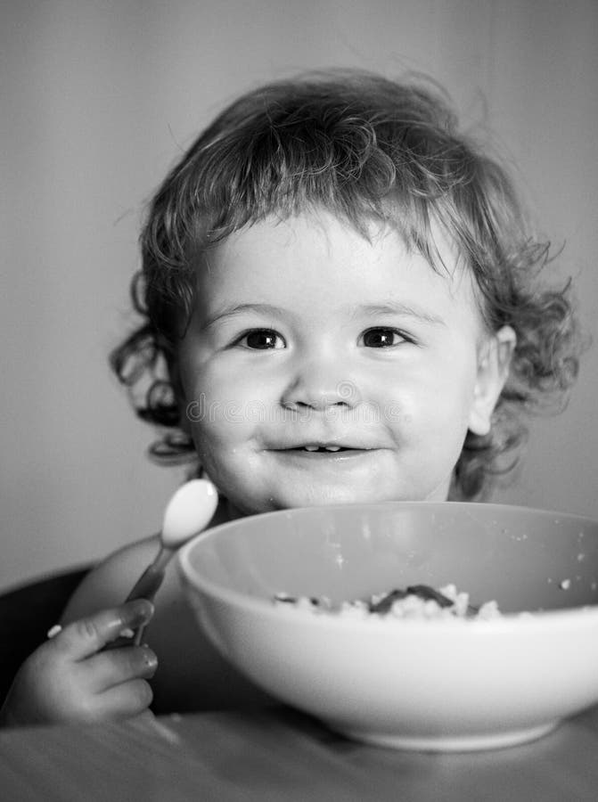 Portrait of Cute Caucasian Child Kid with Spoon. Hungry Messy Baby with ...