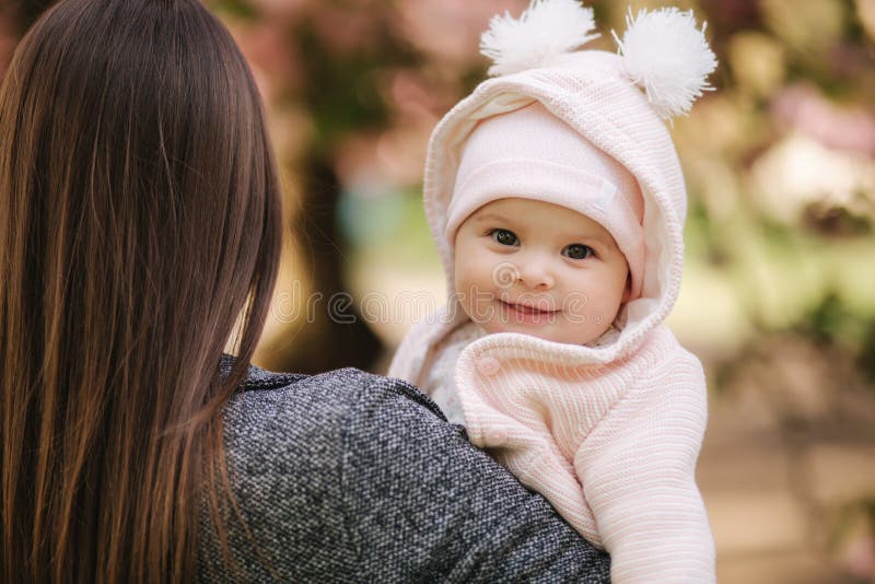 Portrait of Cute Little Baby Girl Outside with Mom. Beautiful Girl Smile.  Five Month Baby Stock Photo - Image of branch, parent: 146919418
