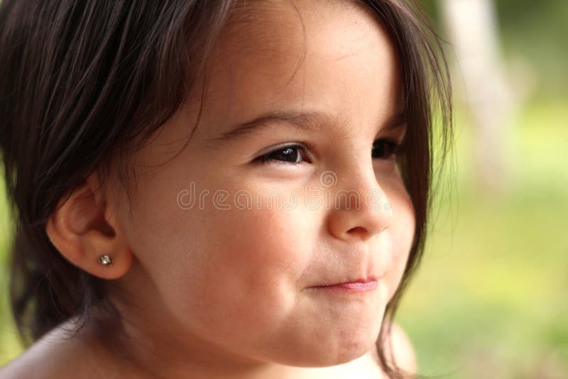 portrait of a cute little cheerful girl in the park outdoors royalty free stock photos portrait of a cute little cheerful girl in the park outdoors royalty free stock photos