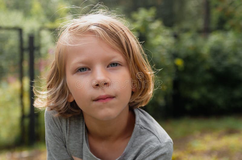 Portrait of a Cute Seven-year-old Girl Stock Photo - Image of ...