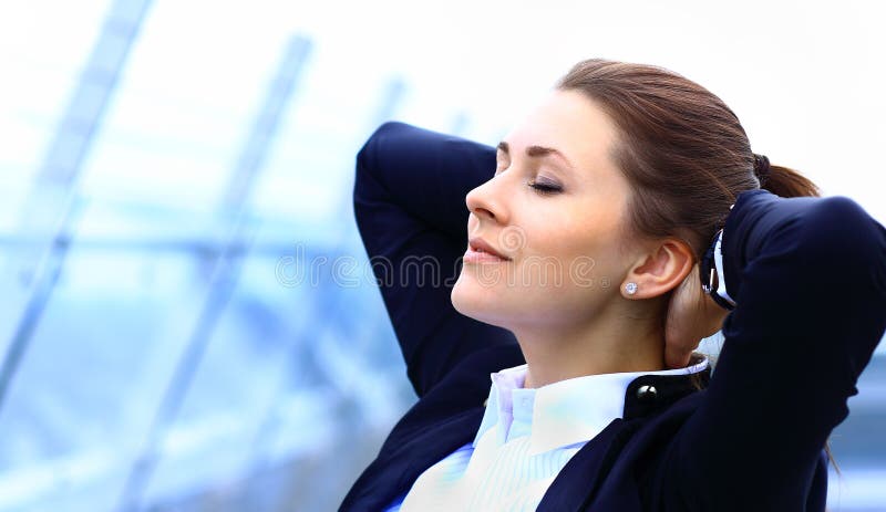 Portrait of cute young business woman relaxing