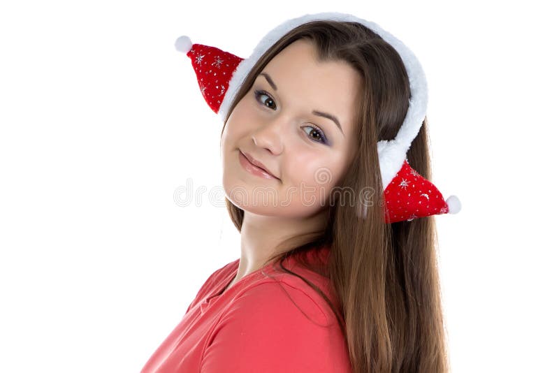 Portrait d'adolescente avec des écouteurs de Noël photos libres de droits Portrait d'adolescente avec des écouteurs de Noël photos libres de droits