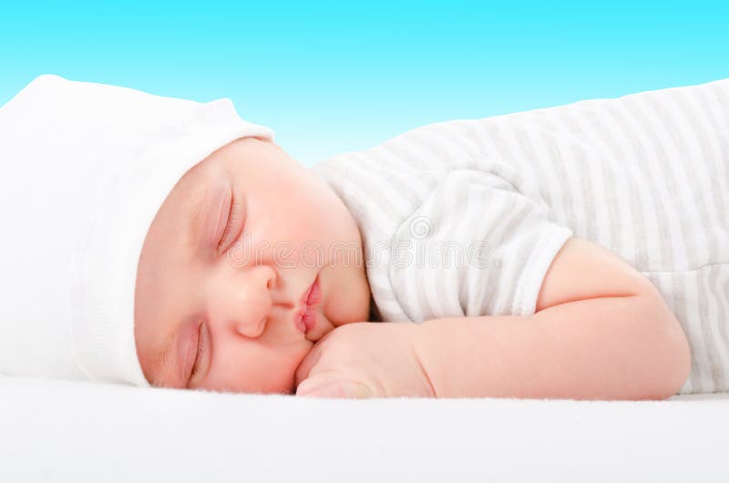 Portrait d'un bébé de sommeil nouveau-né mignon photo libre de droits Portrait d'un bébé de sommeil nouveau-né mignon photo libre de droits