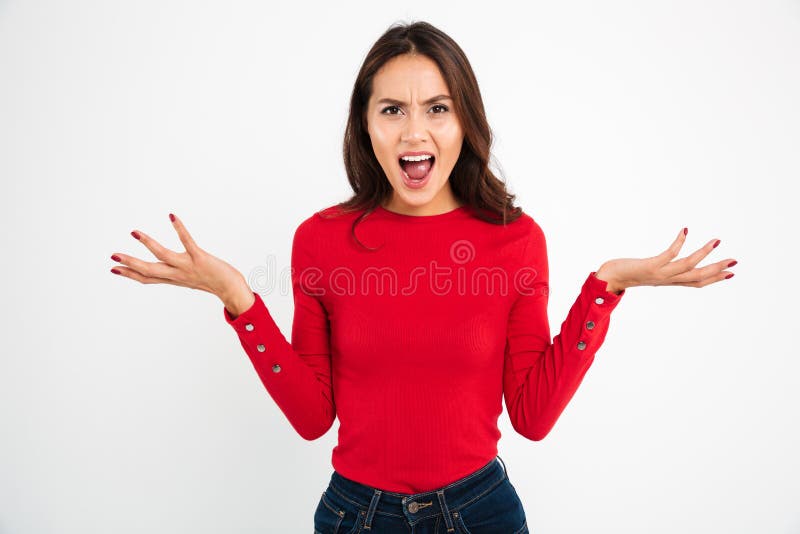 Portrait d'une femme asiatique confuse fâchée image stock Portrait d'une femme asiatique confuse fâchée image stock