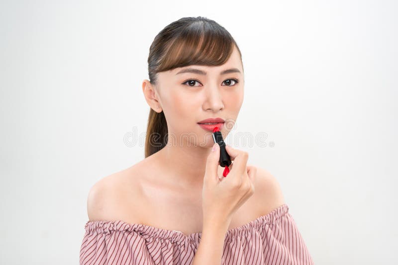 Portrait de jeune image asiatique de beaut? de femme sur le fond blanc images stock Portrait de jeune image asiatique de beaut? de femme sur le fond blanc images stock