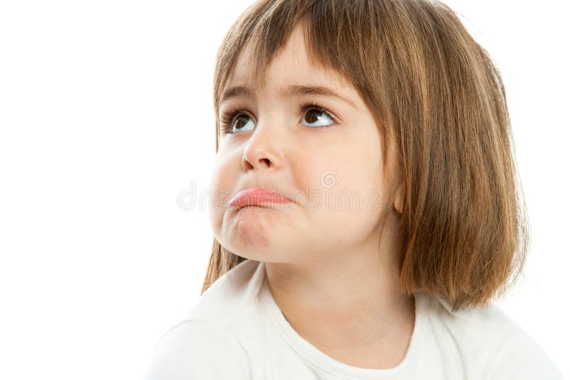 Petite fille tirant vers le haut des lèvres. images stock Petite fille tirant vers le haut des lèvres. images stock