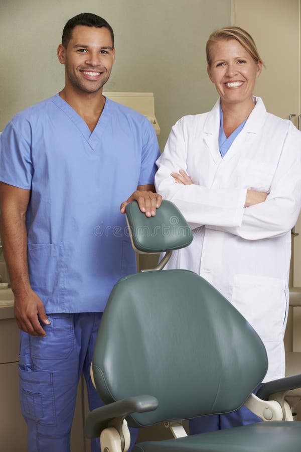 Portrait of Dentist and Dental Nurse in Surgery Stock Photo Image of