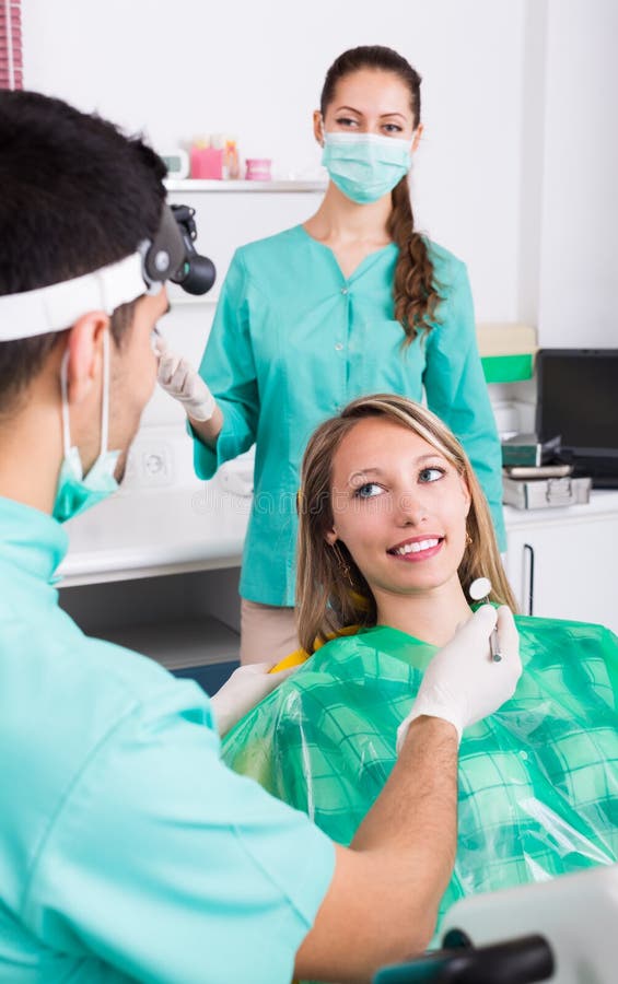 Portrait of Dentist and Patient at Dental Clinic Stock Photo - Image of