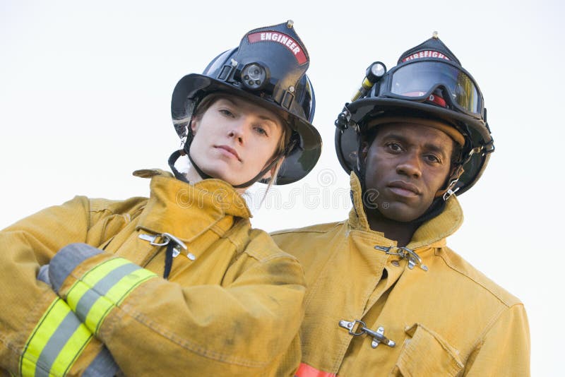 Portrait of firefighters looking at camera. Portrait of firefighters looking at camera