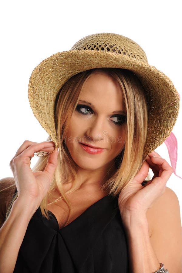 Young Blond Woman's Portrait wearing a hat isolated on a white background. Young Blond Woman's Portrait wearing a hat isolated on a white background