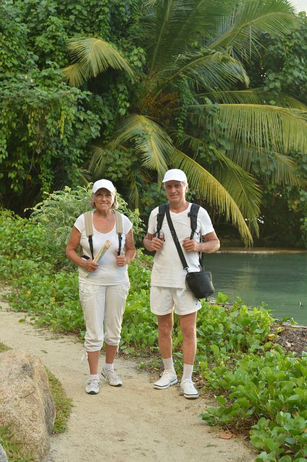 Portrait of an elderly couple of tourists by sea. Portrait of an elderly couple of tourists by sea