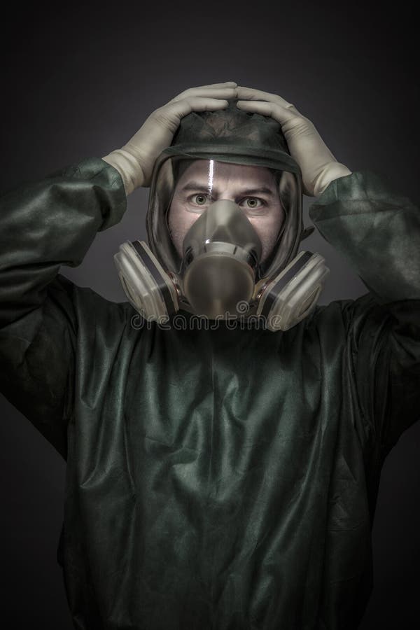 Portrait of a doctor with hands on his head and protective mask stock photography Portrait of a doctor with hands on his head and protective mask stock photography