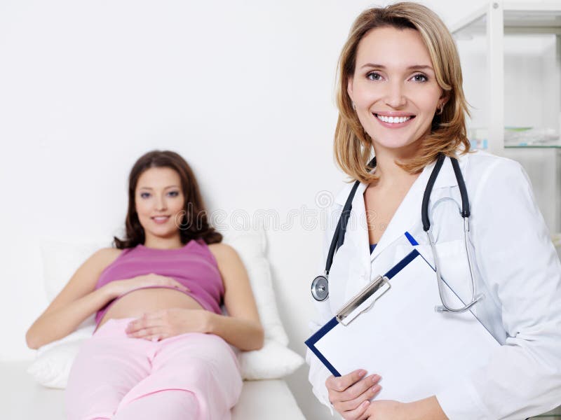 Portrait of doctor with pregnant