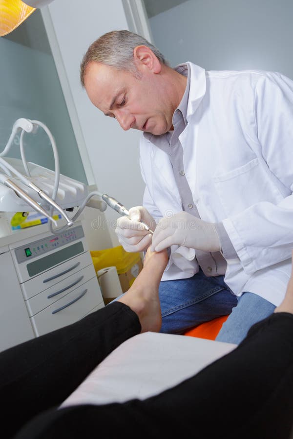 Portrait Doctor Treating Feet Stock Image Image of treat, feet 259959553