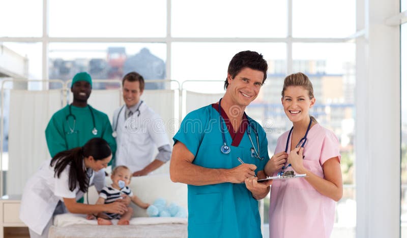 Portrait of Doctors in a hospital looking happy royalty free stock photo Portrait of Doctors in a hospital looking happy royalty free stock photo