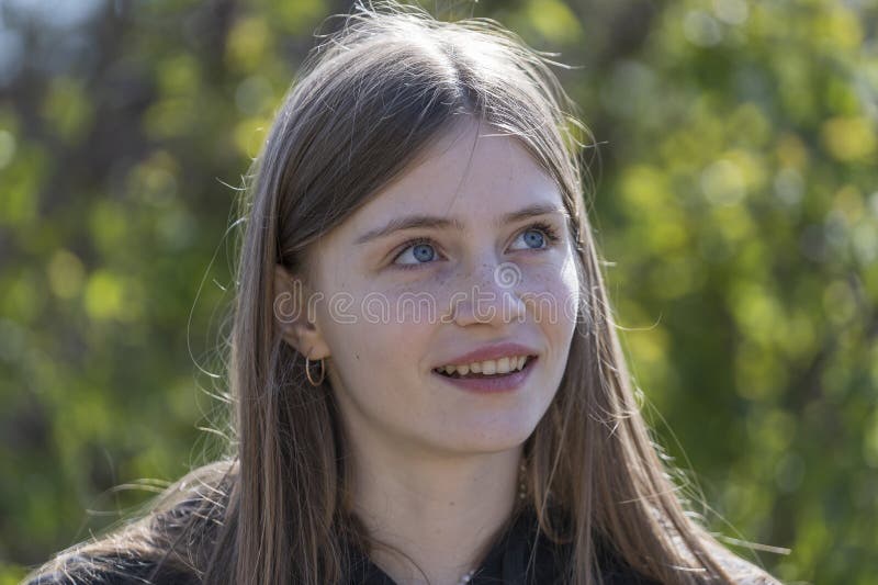 Portrait of a Dreaming Beautiful Young Girl on the Background of Nature ...