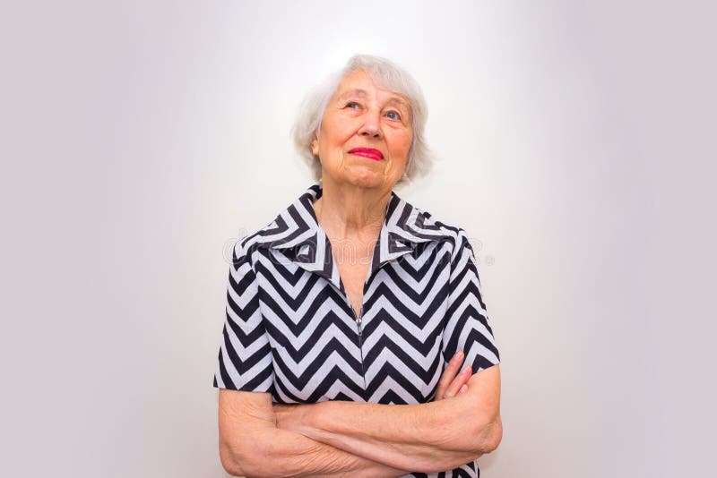 Portrait of Senior Black Woman Smiling at Camera on Green Background ...