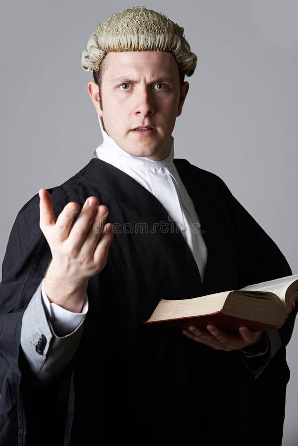 Portrait du livre de Holding Brief And d'avocat faisant la parole photos stock Portrait du livre de Holding Brief And d'avocat faisant la parole photos stock