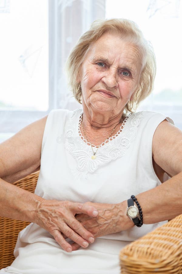 Portrait of an Elderly Lady Sitting in a Chair Stock Photo Image of