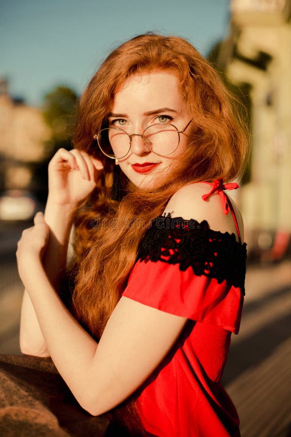 Portrait Of Elegant Ginger Woman With Freckles Wearing Glasses Stock