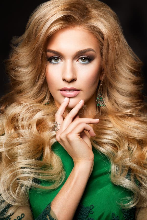 Portrait Of Elegant Blonde Woman With Long Curly Hair And Glamour