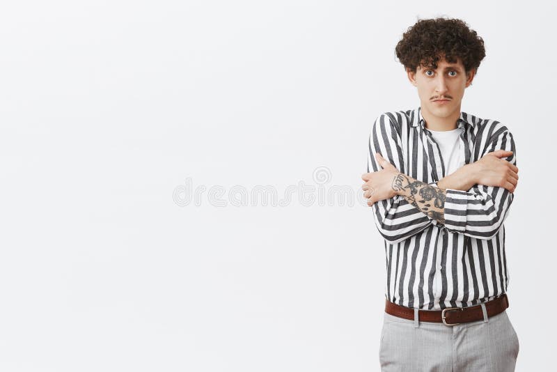Portrait Of Embarrassed Timid Cute Men With Curly Hair And